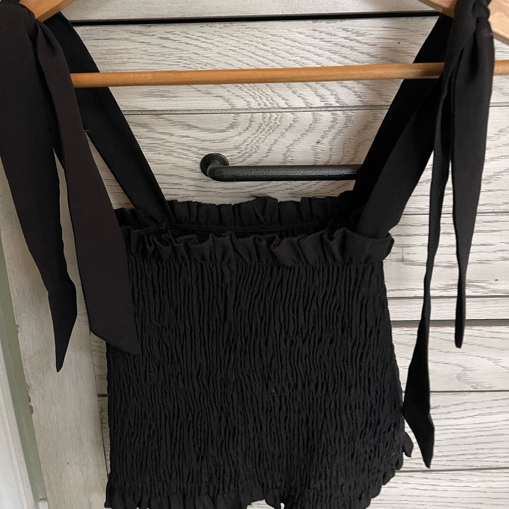 Black smocked crop top with tie closure
